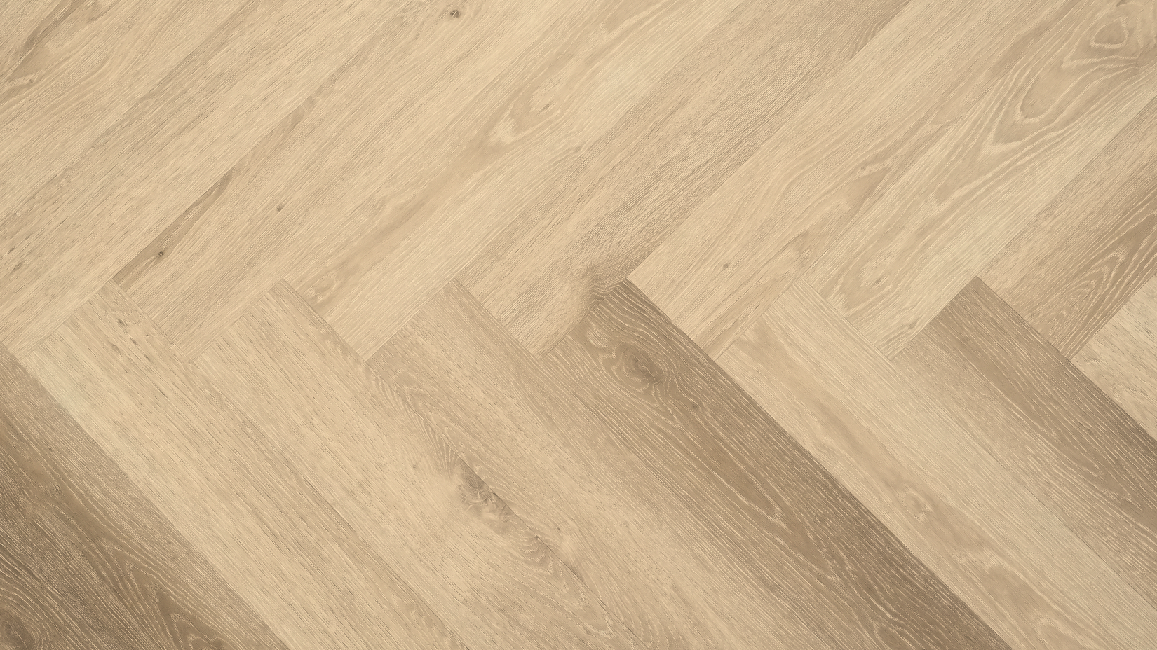 Sambro herringbone SPC flooring close-up with soft neutral tones and wood grain detail