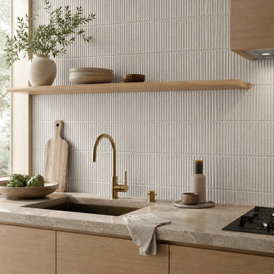 Homey Stripes White 12x24 fluted porcelain tile used as a kitchen backsplash