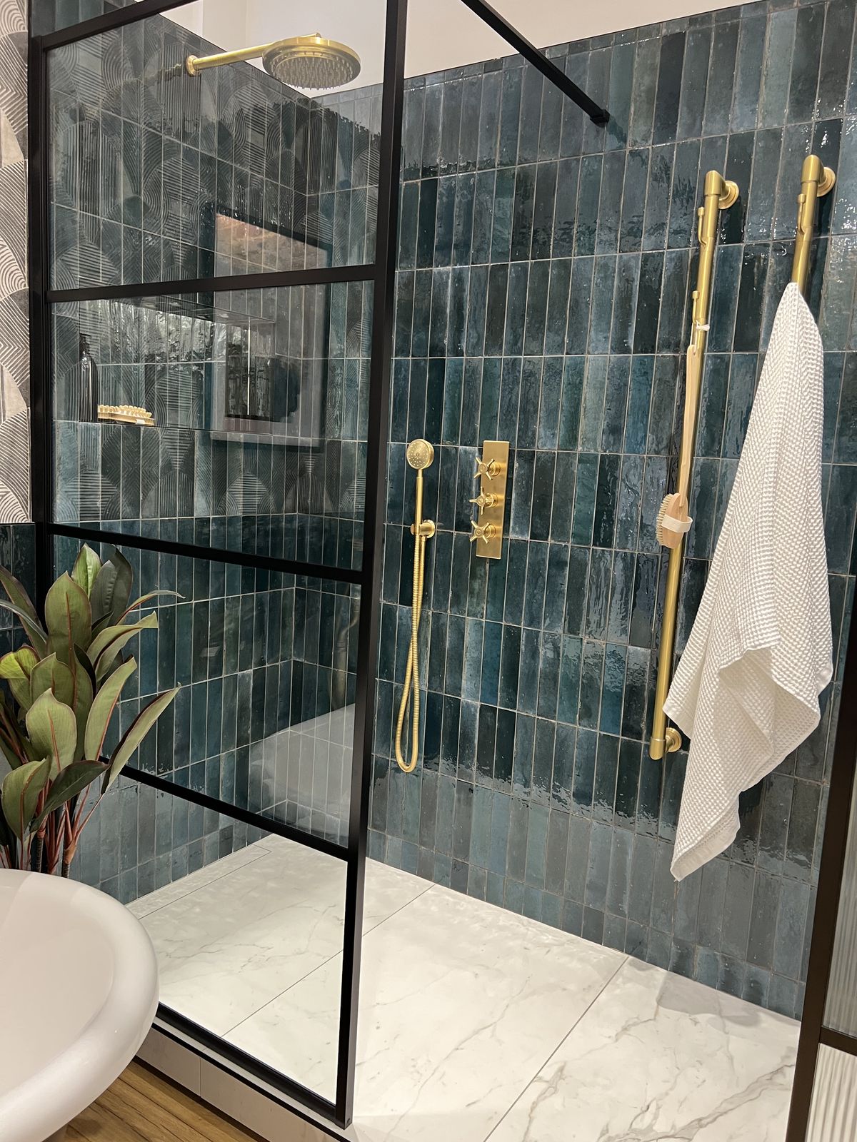 Blue subway tile backsplash bathroom